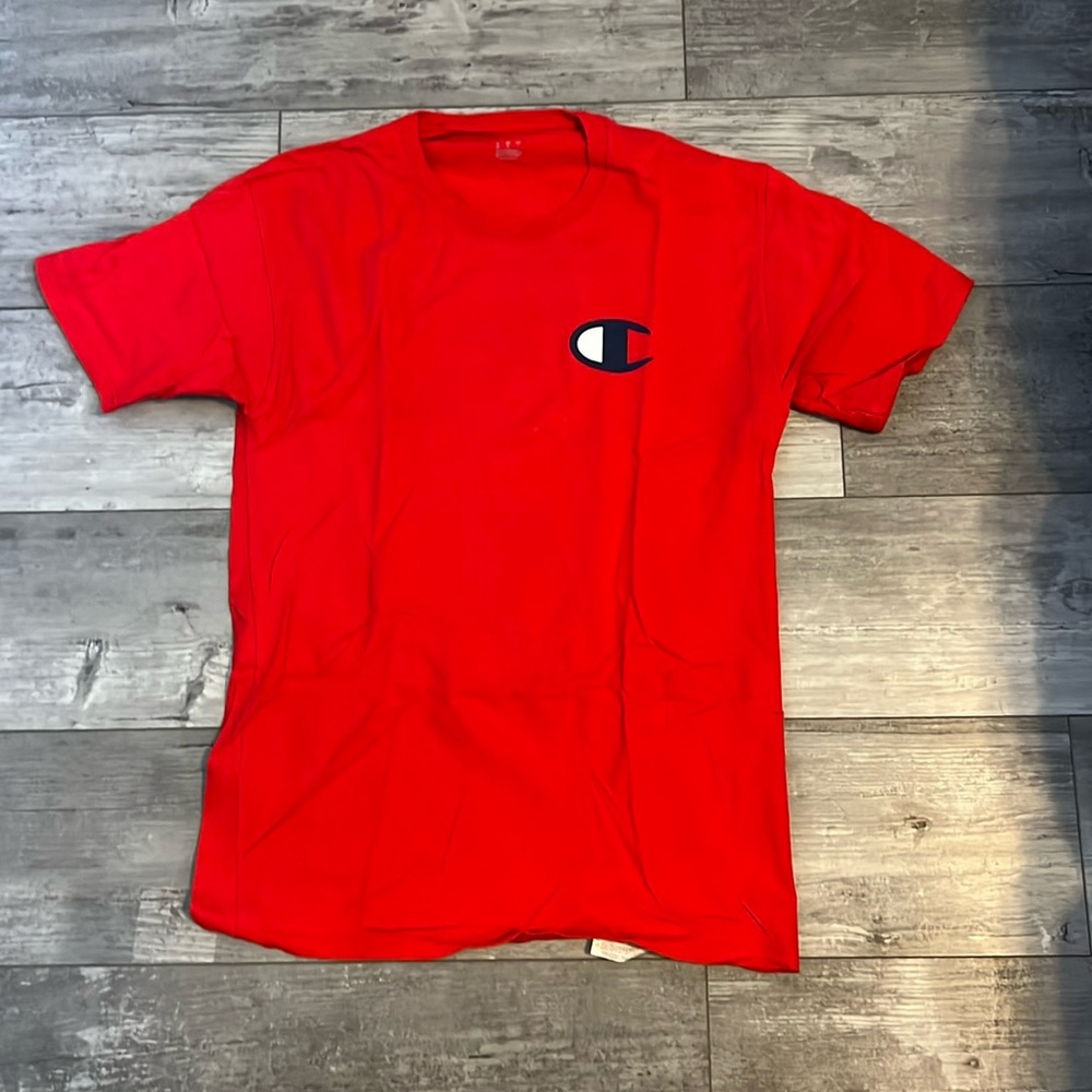 Champion T- Shirt Size: Medium lightly worn